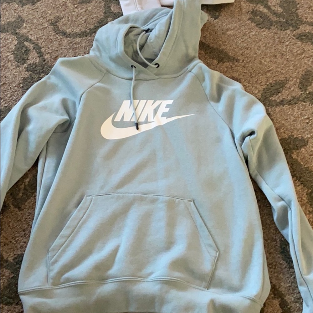 light blue nike pull over with hood
